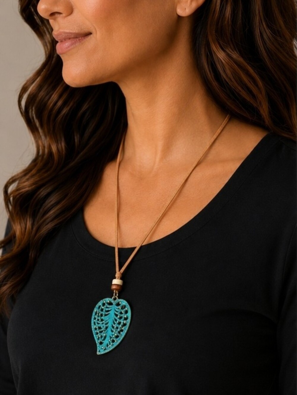 Gorgeous turquoise weathered leaf pendant on a leather corded necklace New